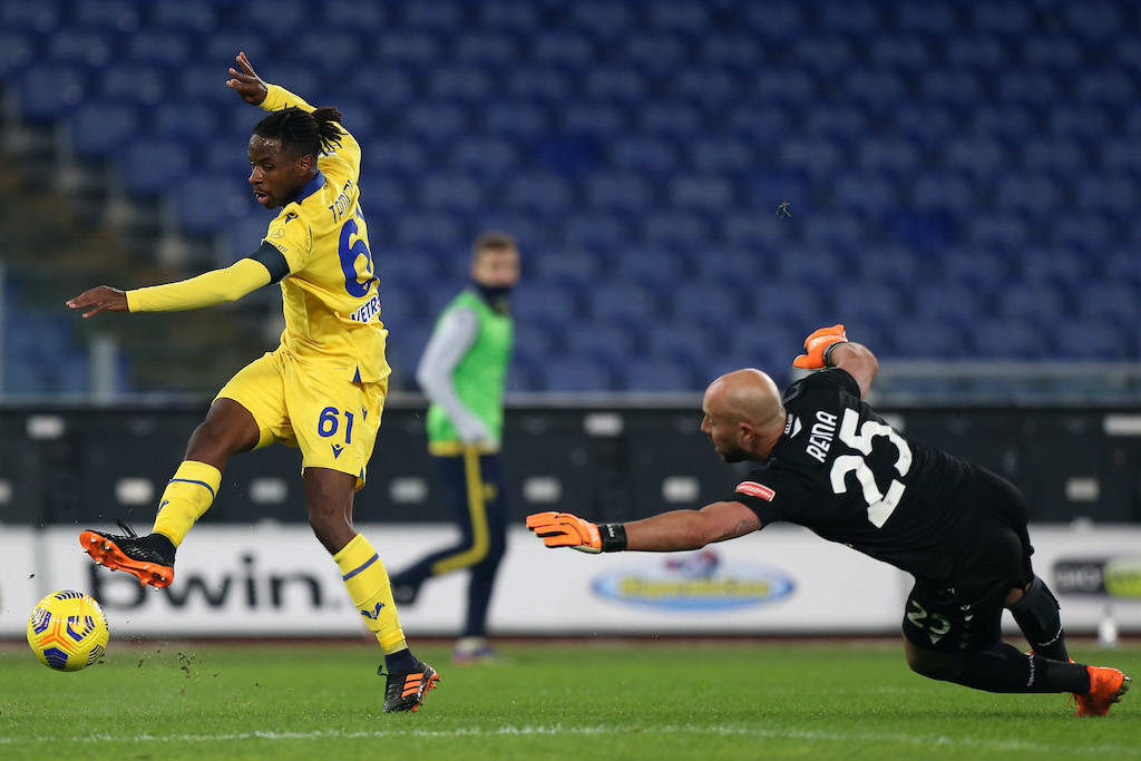 ROME, ITALY - DECEMBER 12: Adrien Tameze of Hellas Verona F.C. scores their team's second goal past Pepe Reina of SS Lazio during the Serie A match between SS Lazio and Hellas Verona FC at Stadio Olimpico on December 12, 2020 in Rome, Italy. Sporting stadiums around Italy remain under strict restrictions due to the Coronavirus Pandemic as Government social distancing laws prohibit fans inside venues resulting in games being played behind closed doors. (Photo by Paolo Bruno/Getty Images)