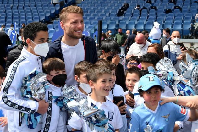 Ciro Immobile poses with children as SS Lazio delivers Easter greetings to Casa Famiglia children at the Olimpic stadium on April 15, 2022 in Rome, Italy.