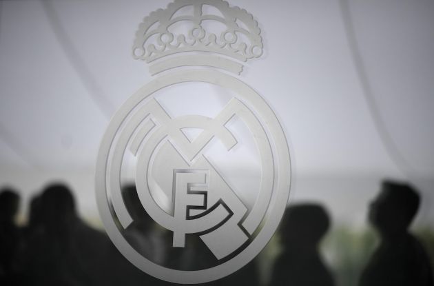 Picture shows badge of Real Madrid, owners of Mario Gila, on a window during Real Madrid's Media Open Day ahead of their UEFA Champions league final footbal match against Liverpool FC, in Madrid on May 22, 2018. (Photo by GABRIEL BOUYS / AFP) (Photo credit should read GABRIEL BOUYS/AFP via Getty Images)