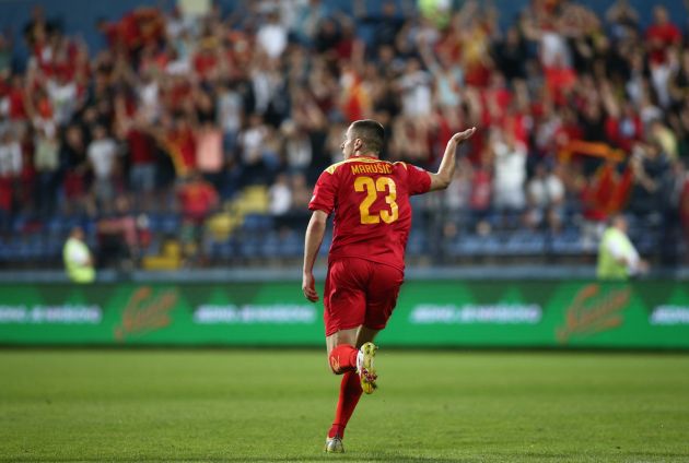 PODGORICA, MONTENEGRO - JUNE 11: Adam Marusic of Montenegro celebrating their team first side goal during the UEFA Nations League League B Group 3 match between Montenegro and Bosnia and Herzegovina at Gradski Stadion on June 11, 2022 in Podgorica, Montenegro. (Photo by Filip Filipovic/Getty Images)