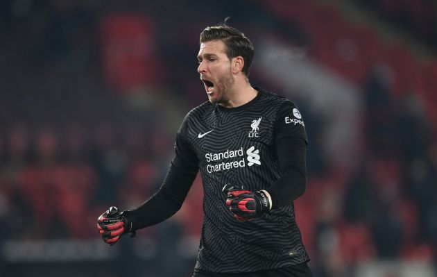 SHEFFIELD, ENGLAND - FEBRUARY 28: Liverpool goalkeeper Adrian celebrates after their side's second goal scored by Roberto Firminho during the Premier League match between Sheffield United and Liverpool at Bramall Lane on February 28, 2021 in Sheffield, England. Sporting stadiums around the UK remain under strict restrictions due to the Coronavirus Pandemic as Government social distancing laws prohibit fans inside venues resulting in games being played behind closed doors. (Photo by Shaun Botterill/Getty Images)