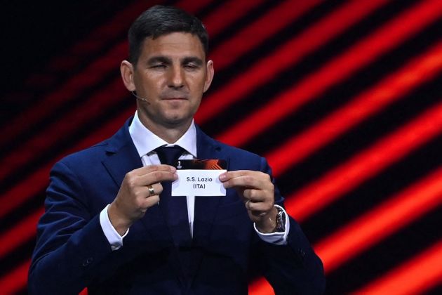 Hungary head coach Zoltan Gera shows the paper slip of Lazio during the draw for the UEFA Europa League football tournament group stage 2022-2023 in Istanbul on August 26, 2022. (Photo by OZAN KOSE / AFP) (Photo by OZAN KOSE/AFP via Getty Images)