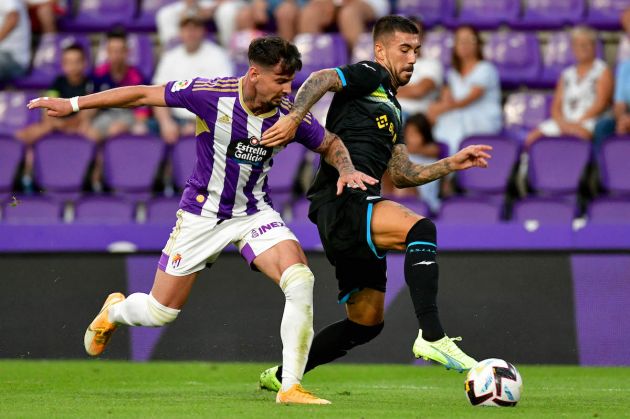VALLADOLID, SPAIN - AUGUST 06: Mattia Zaccagni of SS Lazio compete for the ball with Luis Perez of Real Valladoid C during the friendly match Real Valladoid CF v SS Lazio at Estadio Municipal Jose Zorrilla on August 06, 2022 in Valladolid, Spain. (Photo by Marco Rosi - SS Lazio/Getty Images)