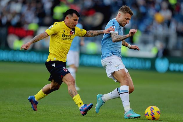 Immobile and Medel during the Serie A match between SS Lazio and Bologna FC at Stadio Olimpico on February 12, 2022 in Rome, Italy.