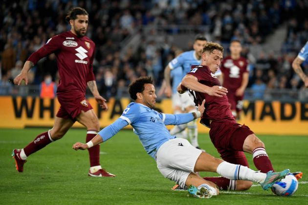 ROME, ITALY - APRIL 16: Felipe Anderson of SS Lazio competes for the ball with Mergim Vojvoda of Torino FC during the Serie A match between SS Lazio and Torino FC at Stadio Olimpico on April 16, 2022 in Rome, Italy. (Photo by Marco Rosi - SS Lazio/Getty Images)