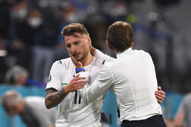 Italy's coach Roberto Mancini (R) greets Italy's forward Ciro Immobile (L) as Immobile is brought off during the UEFA EURO 2020 quarter-final football match between Belgium and Italy at the Allianz Arena in Munich on July 2, 2021. (Photo by ANDREAS GEBERT / POOL / AFP) (Photo by ANDREAS GEBERT/POOL/AFP via Getty Images)