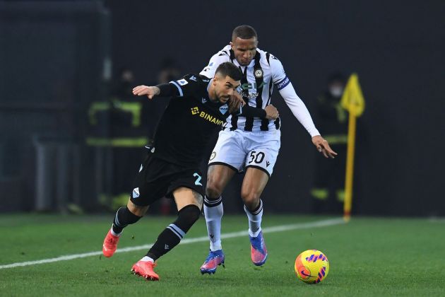 UDINE, ITALY - FEBRUARY 20: Mattia Zaccagni of SS Lazio competes for the ball with Rodrigo Becao of Udinese Calcio during the Serie A match between Udinese Calcio and SS Lazio at Dacia Arena on February 20, 2022 in Udine, Italy. (Photo by Alessandro Sabattini/Getty Images)
