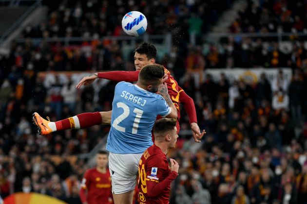 ROME, ITALY - MARCH 20: Sergej Milinkovic-Savic of SS Lazio compete for the ball with Roger Ibanez of AS Roma during the Serie A match between AS Roma and SS Lazio at Stadio Olimpico on March 20, 2022 in Rome, Italy. (Photo by Marco Rosi - SS Lazio/Getty Images)