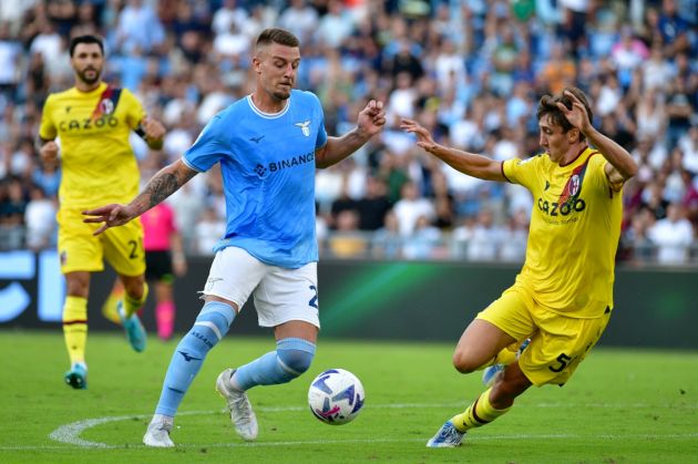 ROME, ITALY - AUGUST 14: Sergej Milinkovic Savic of SS Lazio compete for the ball with Andrea Cambiaso of Bologna FC during the Serie A match between SS Lazio and Bologna FC at Stadio Olimpico on August 14, 2022 in Rome, Ital . (Photo by Marco Rosi - SS Lazio/Getty Images)