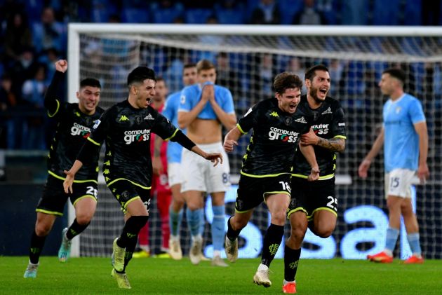 ROME, ITALY - JANUARY 08: Răzvan Gabriel Marin of Empoli FC celebrates scoring his team's second goal, a late equaliser, with his team-mates during the Serie A match between SS Lazio and Empoli FC at Stadio Olimpico on January 08, 2023 in Rome, Italy. (Photo by Marco Rosi - SS Lazio/Getty Images)