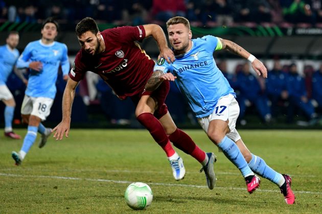 CLUJ-NAPOCA, ROMANIA - FEBRUARY 23: Ciro Immobile of SS Lazio competes for the ball wirh Denis Kolinger of CFR Cluj during the UEFA Europa Conference League knockout round play-off leg two match between CFR Cluj and SS Lazio at Constantin Radulescu Stadium on February 23, 2023 in Cluj-Napoca, Romania. (Photo by Marco Rosi - SS Lazio/Getty Images)