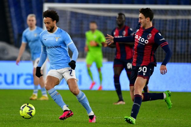 ROME, ITALY - JANUARY 19: Felipe Anderson of SS Lazio compete for the ball with Andrea Cambiaso of Bologna FC during the coppa Italia match between SS Lazio v Bologna FC at Olimpico Stadium on January 19, 2023 in Rome, Italy. (Photo by Marco Rosi - SS Lazio/Getty Images)