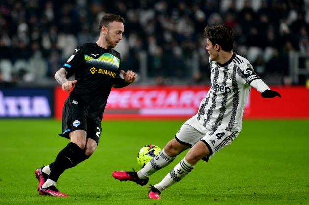TURIN, ITALY - FEBRUARY 02: Manuel Lazzari of SS Lazio compete for the ball with Nicolò Fagioli of Juventus during the coppa Italia quarter final match between Juventus v SS Lazio at Allianz Stadium on February 02, 2023 in Turin, Italy. (Photo by Marco Rosi - SS Lazio/Getty Images)