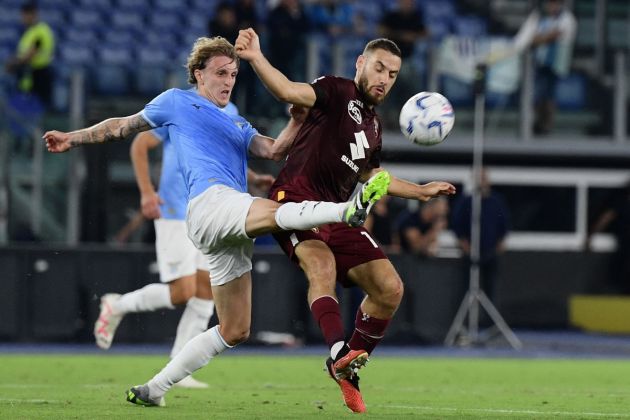 Lazio midfielder #65 Nicolo Rovella (L) fights for the ball with Torino's Croatian forward #16 Nikola Vlasik (R) during the Italian Serie A football match between Lazio and Torino at the Olympic stadium in Rome, on September 27, 2023. (Photo by Filippo MONTEFORTE / AFP) (Photo by FILIPPO MONTEFORTE/AFP via Getty Images)