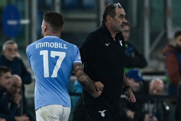 Lazio forward #17 Ciro Immobile (L) passes by Lazio headcoach Maurizio Sarri (R) as he exits the pitch during the UEFA Champions League Group E football match between Lazio and Feyenoord at the Olympic stadium in Rome, on November 7, 2023. (Photo by Tiziana FABI / AFP) (Photo by TIZIANA FABI/AFP via Getty Images)