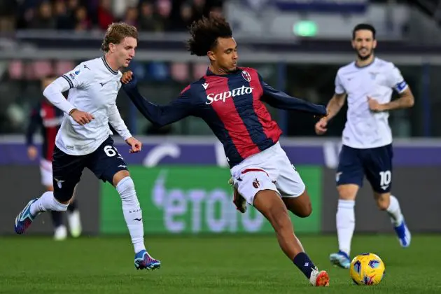 BOLOGNA, ITALY - NOVEMBER 03: Joshua Zirkzee of Bologna FC competes for the ball with Nicolò Rovella of SS Lazio during the Serie A TIM match between Bologna FC and SS Lazio at Stadio Renato Dall'Ara on November 03, 2023 in Bologna, Italy. (Photo by Alessandro Sabattini/Getty Images)