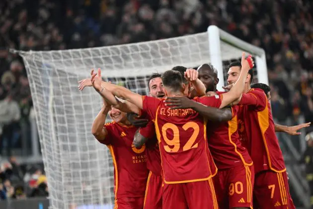 Roma midfielder Bryan Cristante (CL) celebrates teammates after scoring Roma's fourth goal during the UEFA Europa League last 16 first leg football match between AS Roma and Brighton and Hove Albion at the Olympic Stadium in Rome on March 7, 2024. (Photo by Andreas SOLARO / AFP) (Photo by ANDREAS SOLARO/AFP via Getty Images)