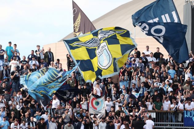 MONZA, ITALY - MAY 04: Fans of SS Lazio show their support by waving flags during the Serie A TIM match between AC Monza and SS Lazio at U-Power Stadium on May 04, 2024 in Monza, Italy. (Photo by Marco Luzzani/Getty Images)