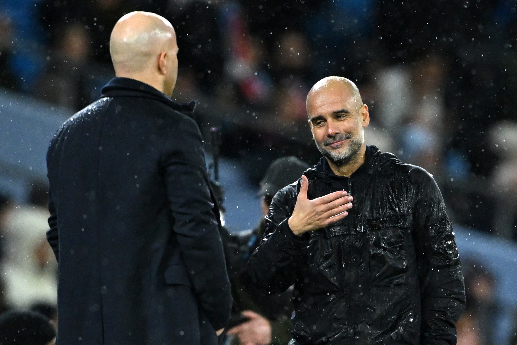 Pep Guardiola and Arne Slot